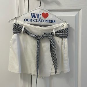 White envelope skort